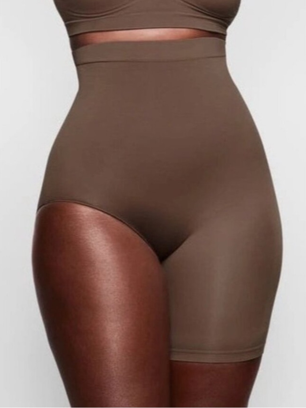 Skims one leg high rise short right leg exposed shapewear
